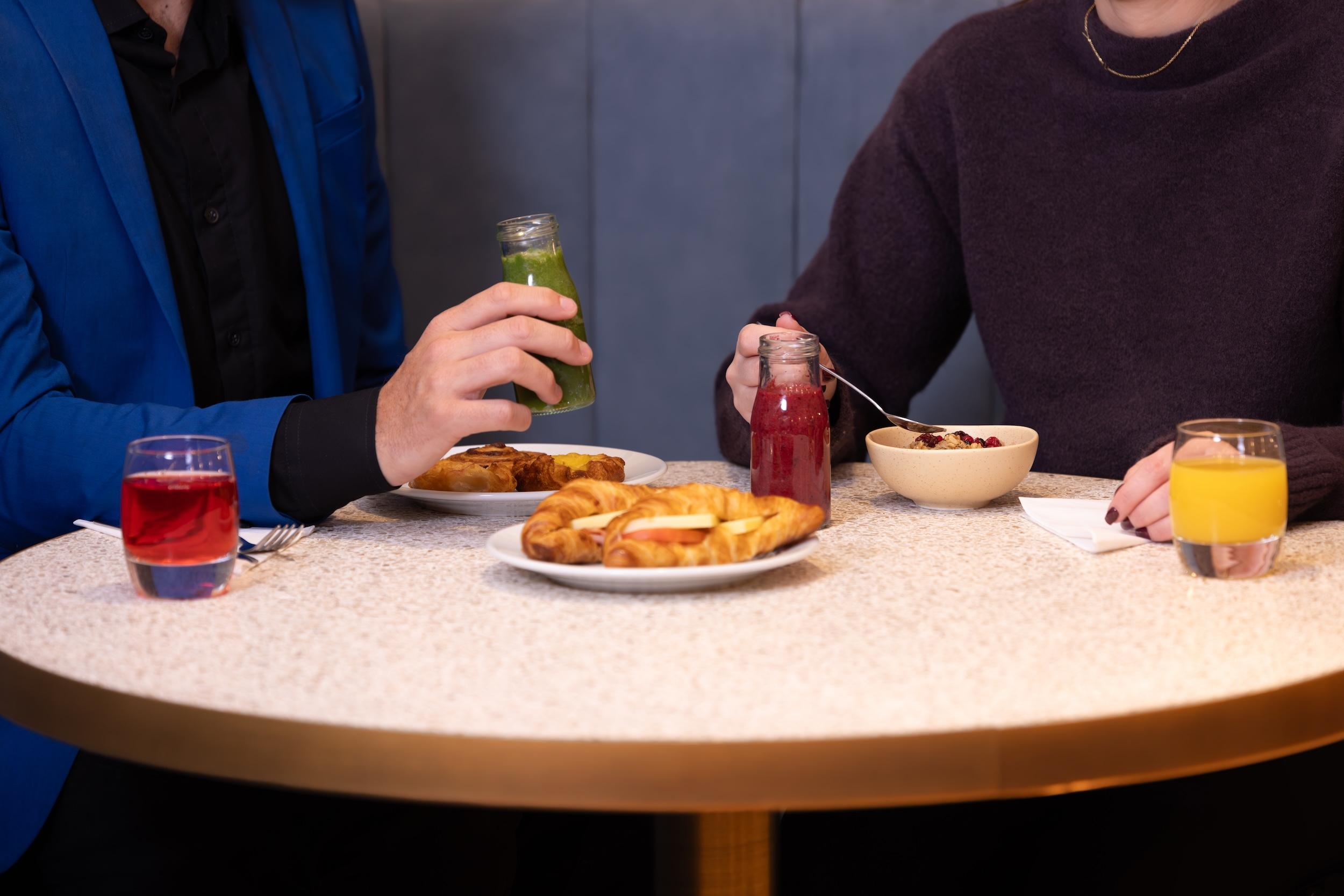 No1 Lounge at Heathrow T2 Eating Breakfast